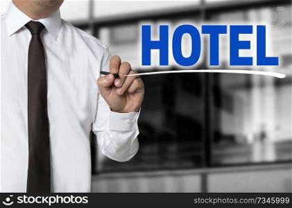 Hotel is written by businessman background concept.. Hotel is written by businessman background concept