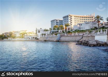 Hotel on the beach. Summer landscape. Vacation and travel concept. Hotel on the beach