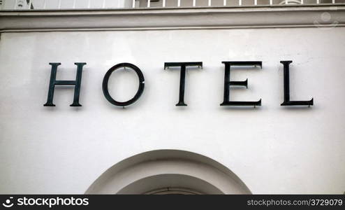 Hotel sign closeup on the wall, Santorini, Greece