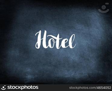 Hotel written on a blackboard