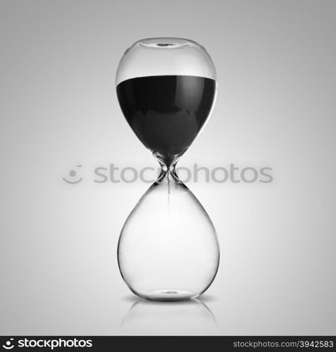 hourglass on gray background