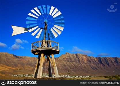 house africa wind turbines and the sky in isle of lanzarote spain