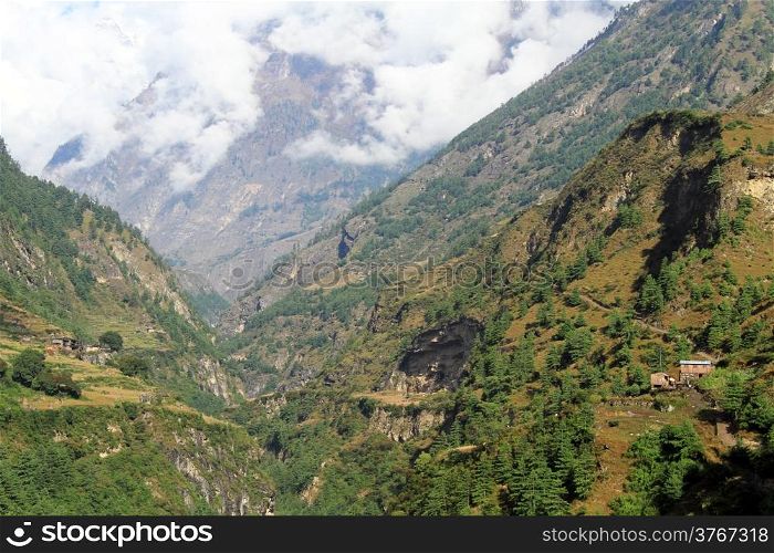 House and mountain near Manaslu in Nepal