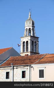 House and top of bell tower in Vala Luka, Croatia