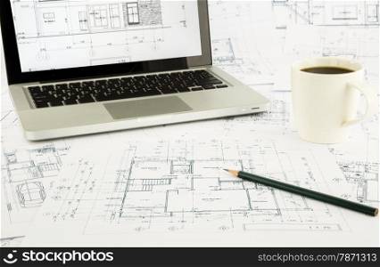 house blueprints and floor plan with laptop, architecture business concepts and ideas