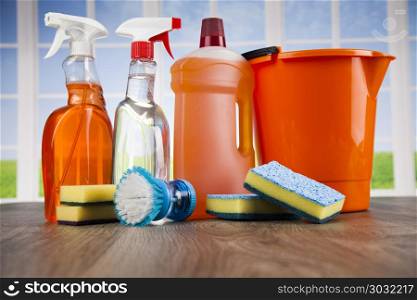 House cleaning product on wood table and window background. House cleaning product and window background