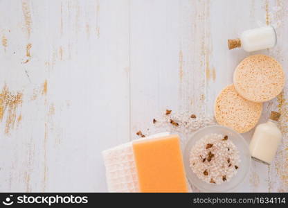 house cleaning tools near pink salt wooden table