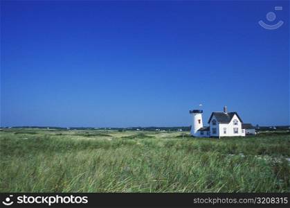 House in a field, Cape Cod, Massachusetts, USA