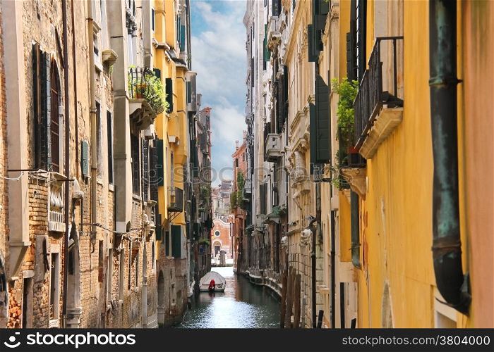 House in a narrow canal in Venice, Italy