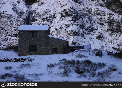 House in a snow covered landscape, Annapurna Range, Himalayas, Nepal