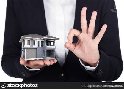 house in business human hand and OK sign isolated on white background