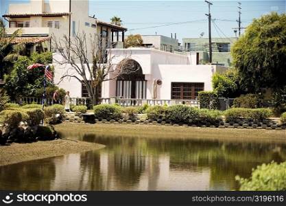 House in front of a canal, Venice, California, USA