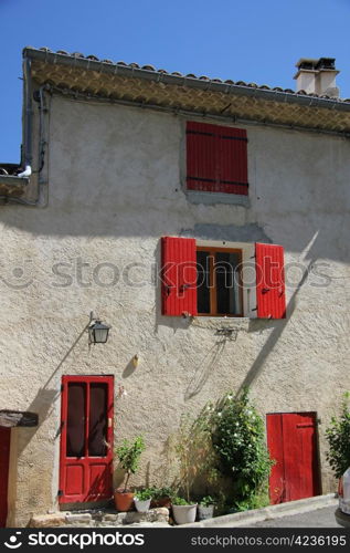 House in Provencal style, plastered facade and wooden shutters