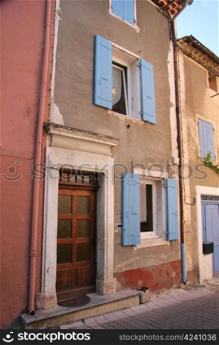 House in Provencal style, plastered facade and wooden shutters