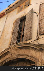 House in the Provence, France. Wooden painted shutters