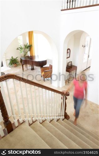 House Interior Showing Staircase And Abstract Female Figure