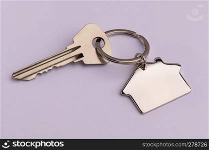 house keys on a pink background