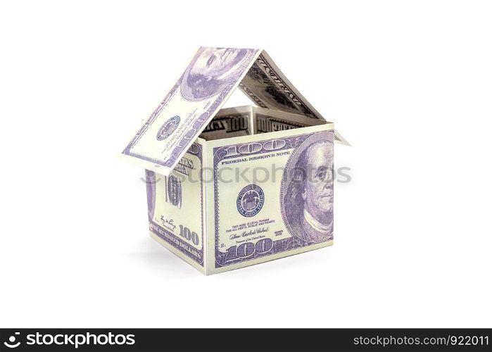 House made of cash Dollar money isolated on white background.