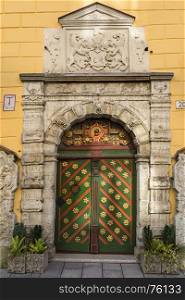 House of Blackheads - An association of local unmarried merchants, ship owners, and foreigners that was active in Livonia (present-day Estonia and Latvia) from the mid-14th century till 1940. This doorway is in the old town of Tallinn in Estonia.
