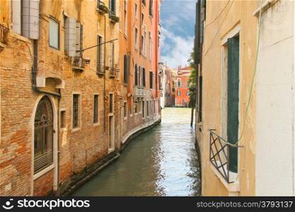 House on a narrow canal in Venice, Italy