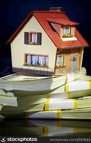house on packs of banknotes...
