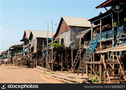 House on stilts with street. House on stilts with street in Cambodia