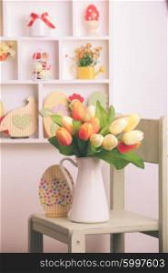 House shelves on a wall - Easter decorations for holiday. Easter decor and cake
