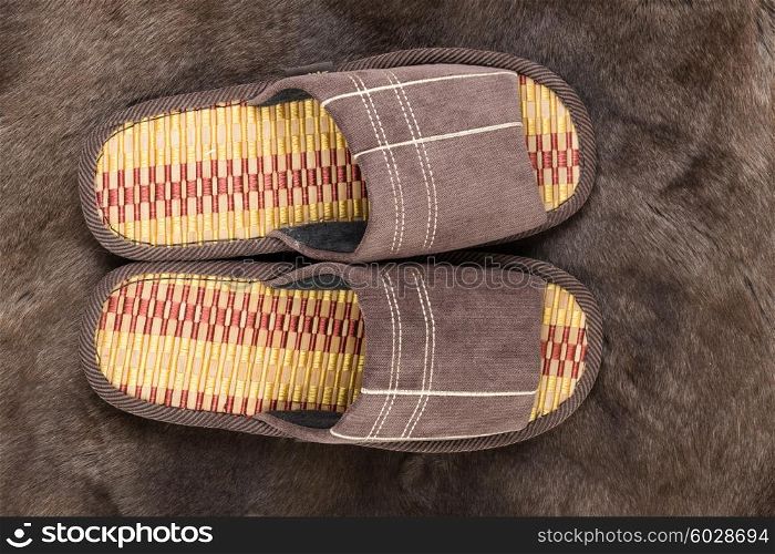 House slippers on a fur rug