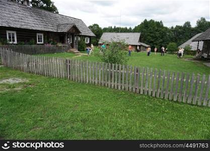 House surrounded by fence in countryside