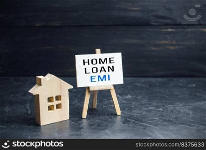 House with home loan EMI easel. Equated Monthly Installment loan. Reducing debt with regular payments over loans period. Attractive interest rates, customized repayment options. Payment plan