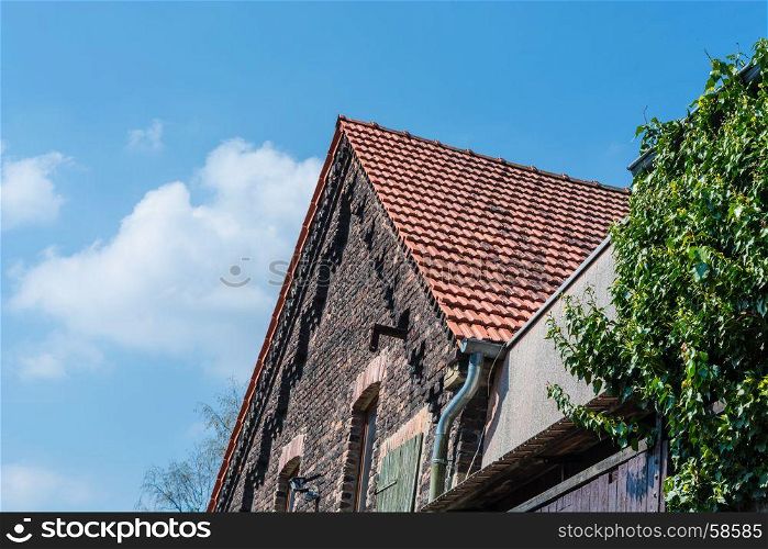 House with stone gable made of brick in Germany.