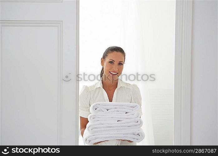 Housekeeper Bringing Towels