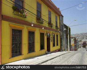 Houses along a cobblestone street, Valparaiso, Chile