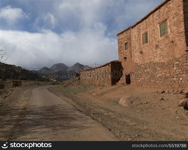 Houses along a road in village, Atlas Mountains, Morocco
