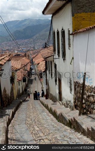 Houses along a stepped alley in Cuzco, Peru