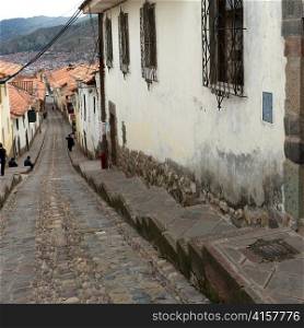 Houses along an alley, Sacred Valley, Machu Picchu, Cuzco, Peru