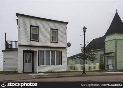 Houses along road in town, Louisbourg, Cape Breton Island, Nova Scotia, Canada