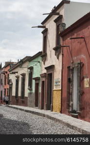 Houses along street, Zona Centro, San Miguel de Allende, Guanajuato, Mexico