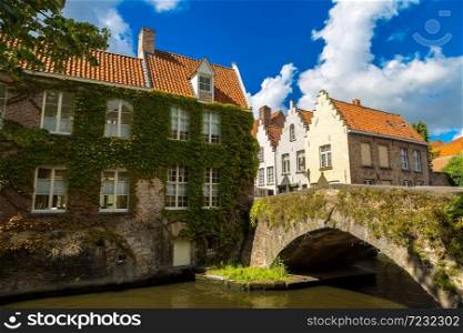 Houses along the canal in Bruges in a beautiful summer day, Belgium