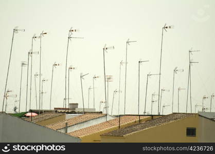Houses and antennas on the roof