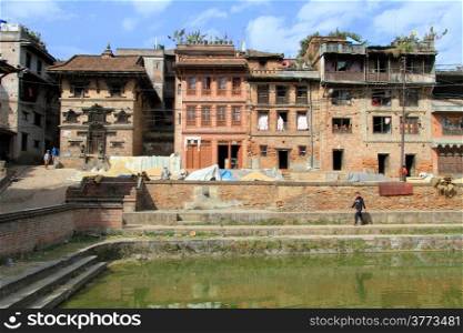 Houses and green pond in Bhaktapur, Nepal