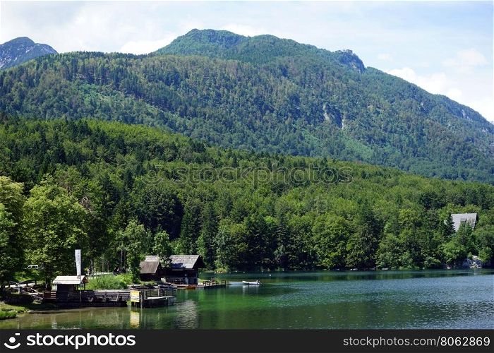 Houses and lake Bohinj in Slovenia