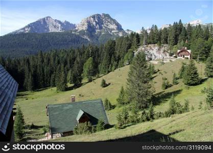 Houses and mountain in Durmitor, Montenegro