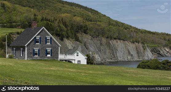 Houses at coast, Meat Cove, Cape North, Cape Breton Island, Nova Scotia, Canada