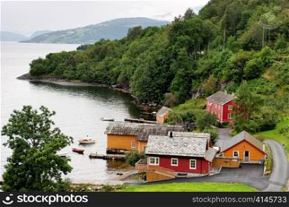 Houses at waterfront, Hardanger, Hardangerfjord, Hardangervidda, Hardanger, Norway