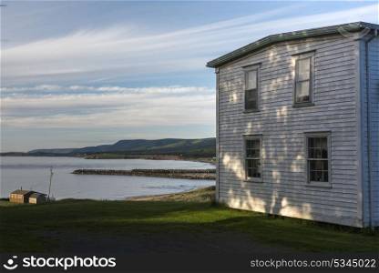 Houses at waterfront, Margaree River, Margaree Harbour, Cabot Trail, Cape Breton Island, Nova Scotia, Canada
