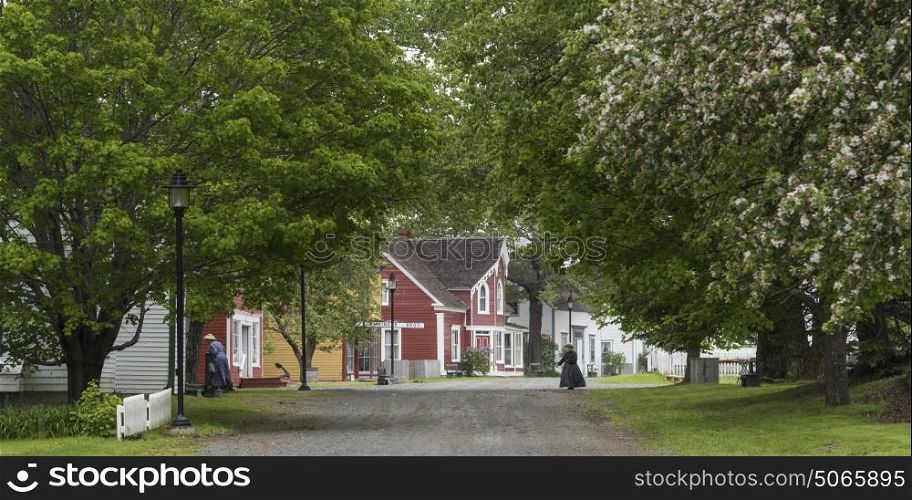 Houses by road in village, Sherbrooke, Nova Scotia, Canada