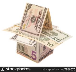 Houses from dollars banknotes. Isolated over white