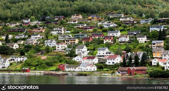 Houses in a town on a hill, Aurlandsvangen, Aurlandsfjord, Sognefjord, Norway