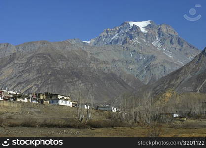 Houses in front of a mountain, Annapurna Range, Himalayas, Nepal